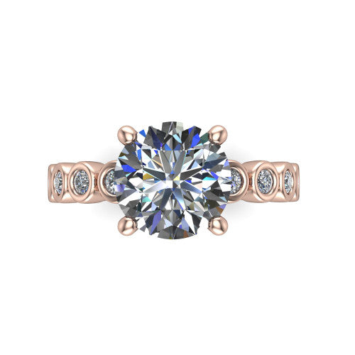 Kinsley round solitaire engagement ring in 14K Rose Gold with bezel-set diamond accent band, top-down view of the center stone and bezel band