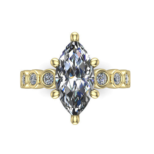Kinsley marquise solitaire engagement ring in 18K Yellow Gold with bezel-set diamond accent band, top-down view of the center stone and bezel band
