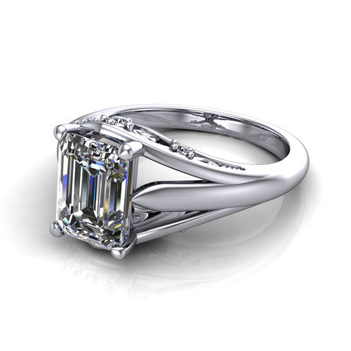 Lucy emerald solitaire engagement ring in Platinum with pavé split shank and filigree gallery, three-quarter perspective view