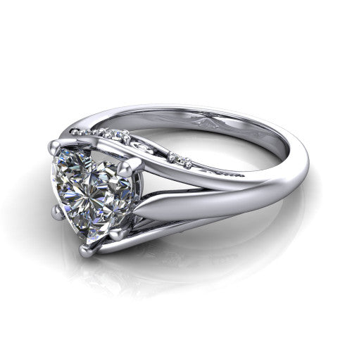 Lucy heart solitaire engagement ring in 18K White Gold with pavé split shank and filigree gallery, three-quarter perspective view