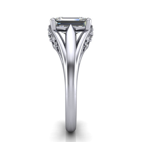 Lucy emerald solitaire engagement ring in 18K White Gold with pavé split shank and filigree gallery, side profile showing the pavé split shank and filigree under-bridge