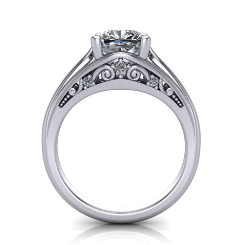 Lucy cushion solitaire engagement ring in Platinum with pavé split shank and filigree gallery, through-finger front profile showing the filigree gallery