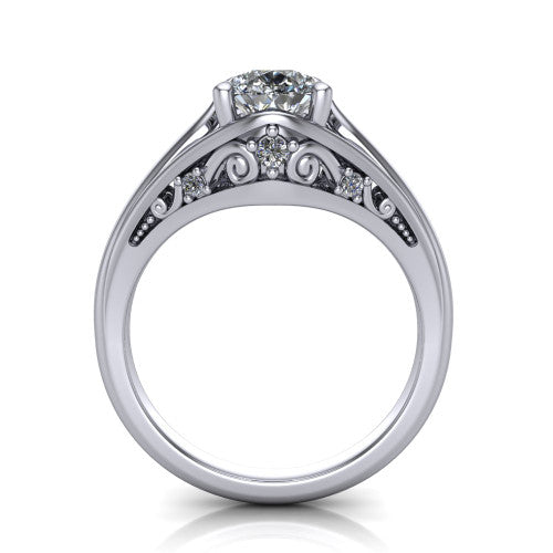 Lucy pear solitaire engagement ring in Platinum with pavé split shank and filigree gallery, through-finger front profile showing the filigree gallery