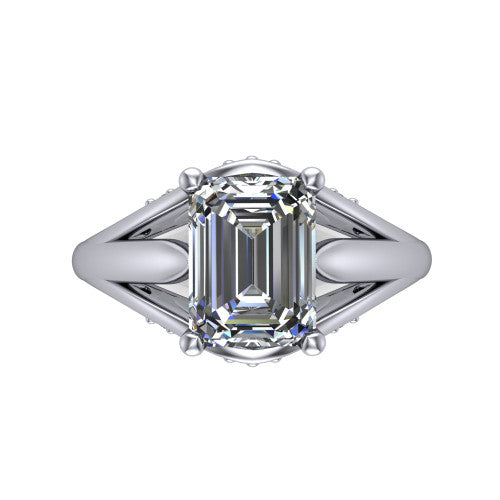 Lucy emerald solitaire engagement ring in 18K White Gold with pavé split shank and filigree gallery, top-down view of the center stone and split shank