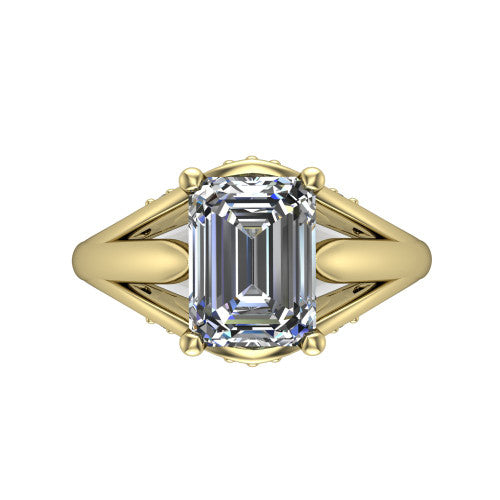 Lucy emerald solitaire engagement ring in 14K Yellow Gold with pavé split shank and filigree gallery, top-down view of the center stone and split shank