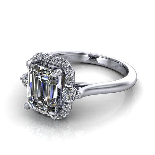 Riley emerald halo engagement ring in 14K White Gold with squared pavé halo and round side accents, three-quarter perspective view