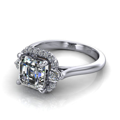 Riley asscher halo engagement ring in Platinum with squared pavé halo and round side accents, three-quarter perspective view