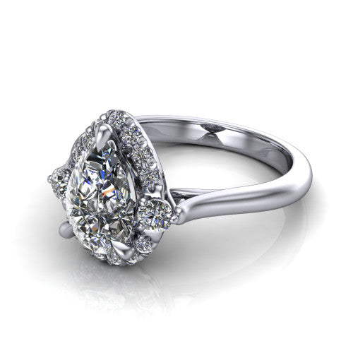 Riley pear halo engagement ring in 18K White Gold with squared pavé halo and round side accents, three-quarter perspective view