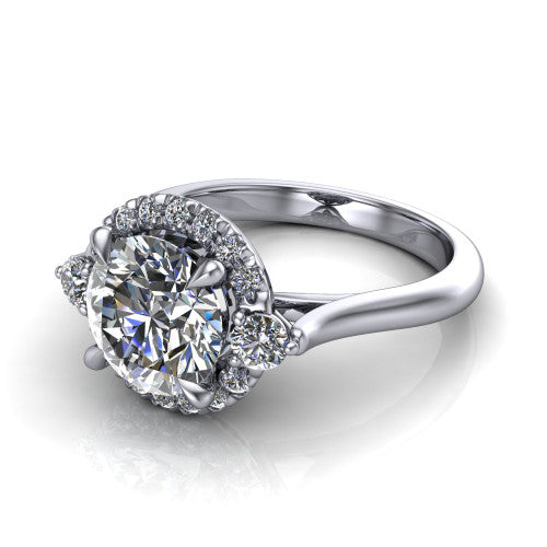 Riley round halo engagement ring in 18K White Gold with squared pavé halo and round side accents, three-quarter perspective view