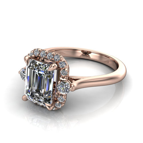 Riley emerald halo engagement ring in 14K Rose Gold with squared pavé halo and round side accents, three-quarter perspective view