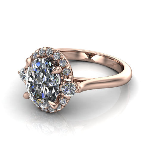 Riley oval halo engagement ring in 18K Rose Gold with squared pavé halo and round side accents, three-quarter perspective view