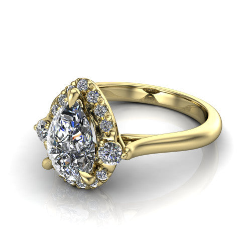 Riley pear halo engagement ring in 14K Yellow Gold with squared pavé halo and round side accents, three-quarter perspective view