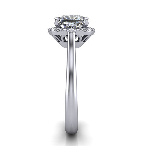 Riley cushion halo engagement ring in 14K White Gold with squared pavé halo and round side accents, side profile showing the plain cathedral band and openwork gallery