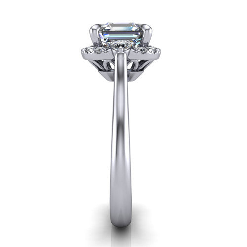 Riley asscher halo engagement ring in Platinum with squared pavé halo and round side accents, side profile showing the plain cathedral band and openwork gallery