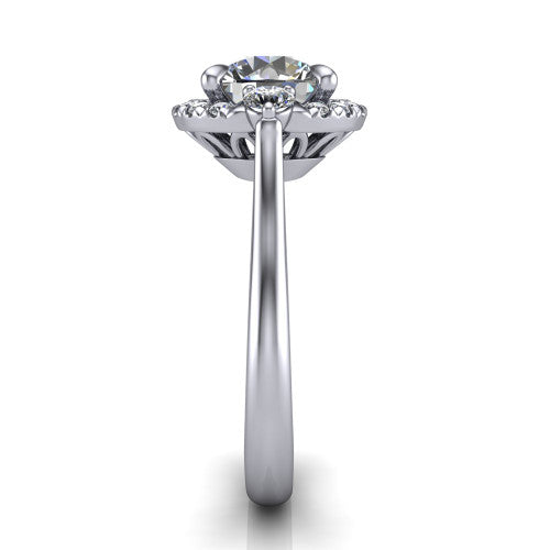 Riley round halo engagement ring in 18K White Gold with squared pavé halo and round side accents, side profile showing the plain cathedral band and openwork gallery