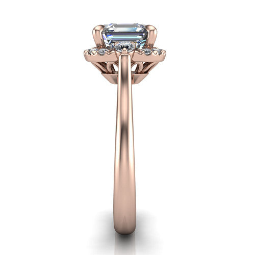 Riley asscher halo engagement ring in 18K Rose Gold with squared pavé halo and round side accents, side profile showing the plain cathedral band and openwork gallery