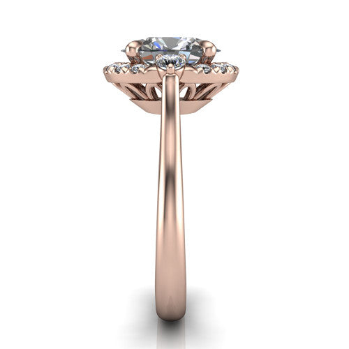 Riley oval halo engagement ring in 18K Rose Gold with squared pavé halo and round side accents, side profile showing the plain cathedral band and openwork gallery