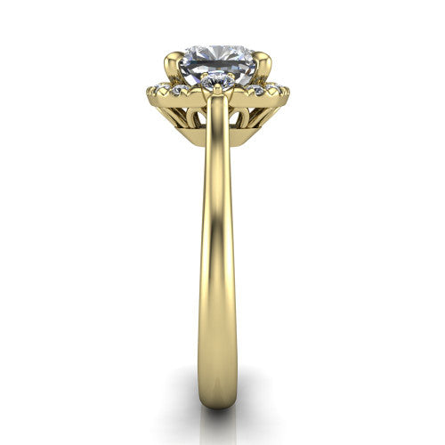 Riley cushion halo engagement ring in 18K Yellow Gold with squared pavé halo and round side accents, side profile showing the plain cathedral band and openwork gallery