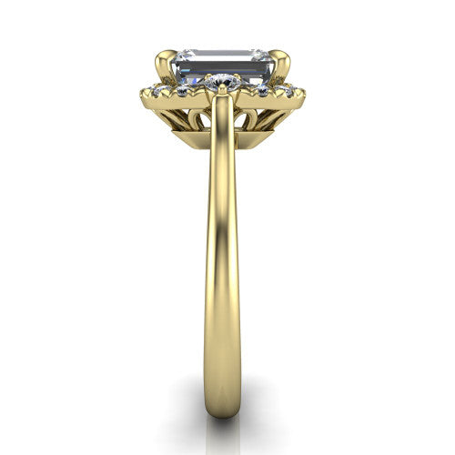 Riley emerald halo engagement ring in 18K Yellow Gold with squared pavé halo and round side accents, side profile showing the plain cathedral band and openwork gallery