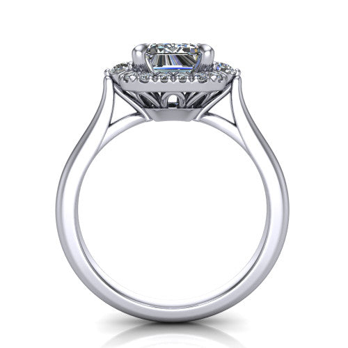 Riley emerald halo engagement ring in Platinum with squared pavé halo and round side accents, through-finger front profile