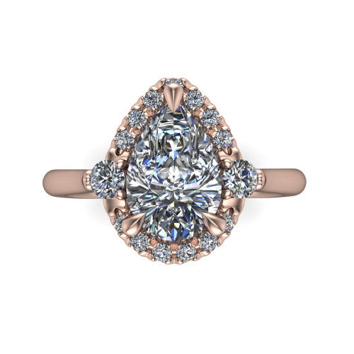 Riley pear halo engagement ring in 18K Rose Gold with squared pavé halo and round side accents, top-down view of the squared halo and round side accents