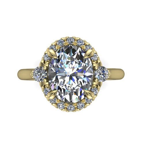Riley oval halo engagement ring in 14K Yellow Gold with squared pavé halo and round side accents, top-down view of the squared halo and round side accents