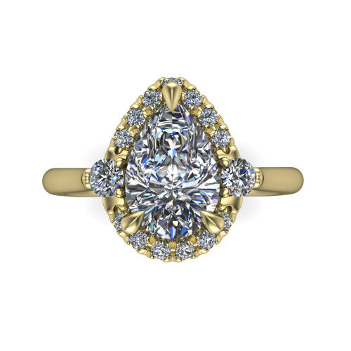 Riley pear halo engagement ring in 18K Yellow Gold with squared pavé halo and round side accents, top-down view of the squared halo and round side accents