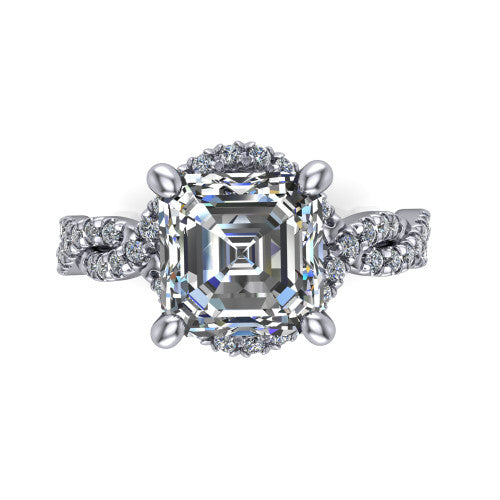Madison emerald halo engagement ring in Platinum with twisted pavé infinity band, top-down view of the halo and twisted band