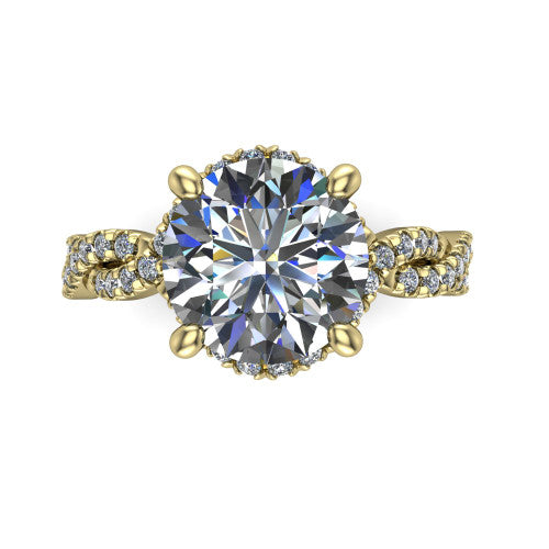 Madison round halo engagement ring in 14K Yellow Gold with twisted pavé infinity band, top-down view of the halo and twisted band