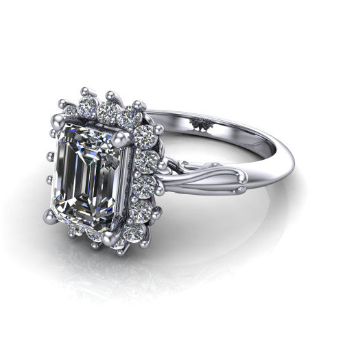 Serenity emerald halo engagement ring in 18K White Gold, three-quarter perspective showing the emerald center diamond in a floral cluster halo with filigree shoulders