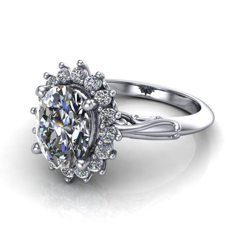 Serenity oval halo engagement ring in 18K White Gold, three-quarter perspective showing the oval center diamond in a floral cluster halo with filigree shoulders