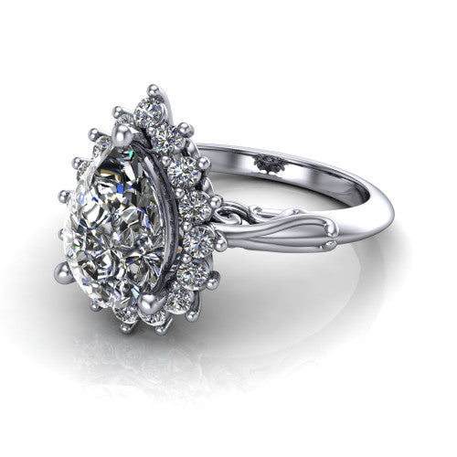 Serenity pear halo engagement ring in 18K White Gold, three-quarter perspective showing the pear center diamond in a floral cluster halo with filigree shoulders