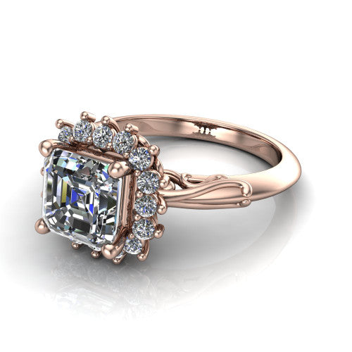 Serenity square emerald halo engagement ring in 18K Rose Gold, three-quarter perspective showing the square emerald center diamond in a floral cluster halo with filigree shoulders