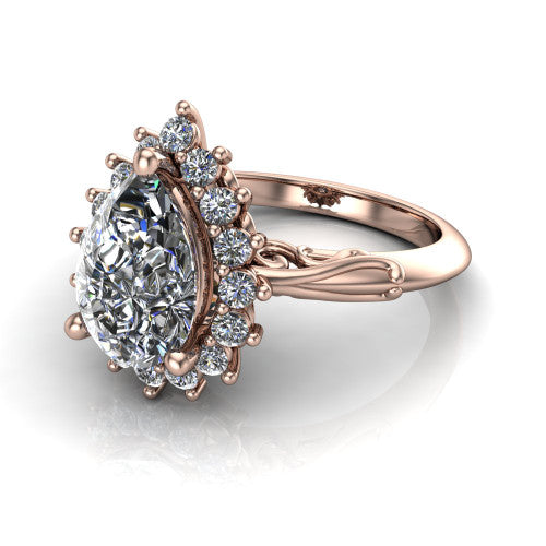 Serenity pear halo engagement ring in 14K Rose Gold, three-quarter perspective showing the pear center diamond in a floral cluster halo with filigree shoulders