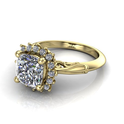 Serenity cushion halo engagement ring in 18K Yellow Gold, three-quarter perspective showing the cushion center diamond in a floral cluster halo with filigree shoulders