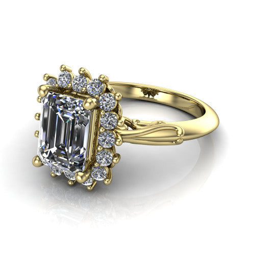 Serenity emerald halo engagement ring in 18K Yellow Gold, three-quarter perspective showing the emerald center diamond in a floral cluster halo with filigree shoulders
