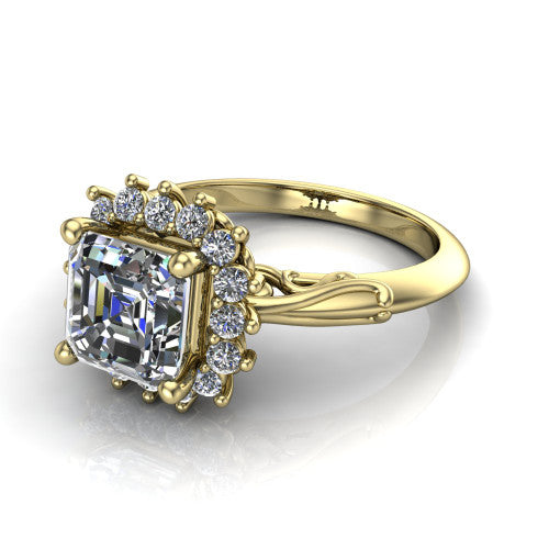 Serenity square emerald halo engagement ring in 18K Yellow Gold, three-quarter perspective showing the square emerald center diamond in a floral cluster halo with filigree shoulders