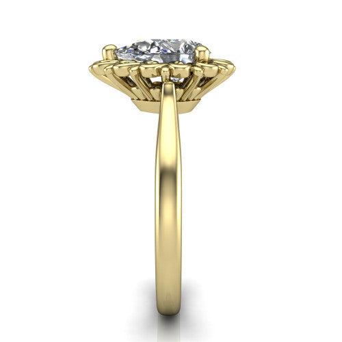 Naomi pear solitaire engagement ring in 18K Yellow Gold with vintage floral filigree frame, side profile showing the plain band and filigree gallery