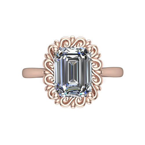 Naomi emerald solitaire engagement ring in 14K Rose Gold with vintage floral filigree frame, top-down view of the floral filigree frame around the center stone