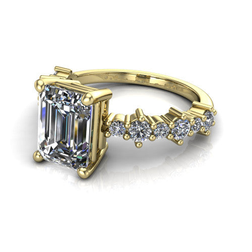 Leah emerald classic engagement ring in 18K Yellow Gold with baguette and cluster accent band, three-quarter perspective view