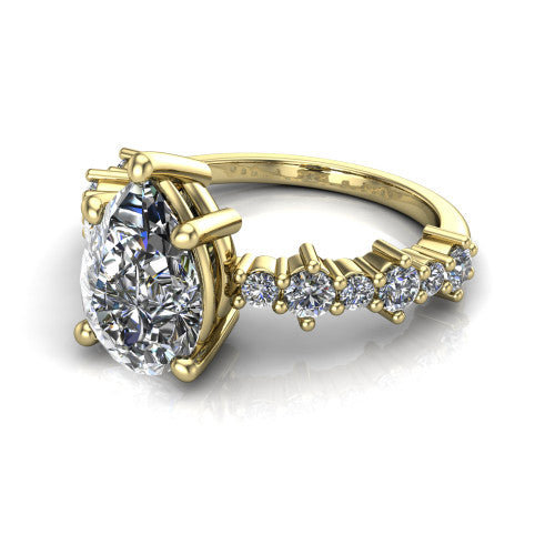 Leah pear classic engagement ring in 14K Yellow Gold with baguette and cluster accent band, three-quarter perspective view
