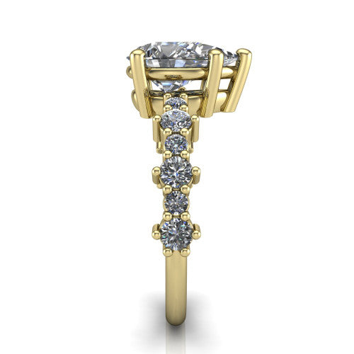 Leah pear classic engagement ring in 14K Yellow Gold with baguette and cluster accent band, side profile showing the cluster and baguette accent band