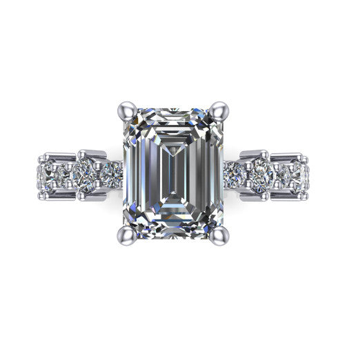Leah emerald classic engagement ring in 18K White Gold with baguette and cluster accent band, top-down view of the center stone and baguette accents