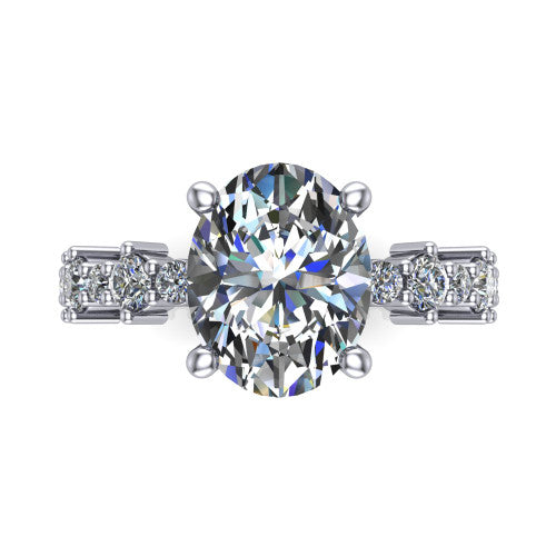 Leah oval classic engagement ring in Platinum with baguette and cluster accent band, top-down view of the center stone and baguette accents