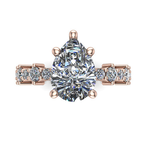 Leah pear classic engagement ring in 14K Rose Gold with baguette and cluster accent band, top-down view of the center stone and baguette accents
