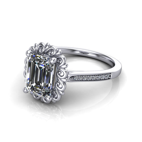 Eden emerald solitaire engagement ring in Platinum with vintage floral filigree frame and pavé band, three-quarter perspective view