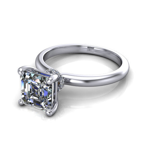Quinn emerald solitaire engagement ring in 14K White Gold with hidden halo and plain band, three-quarter perspective view