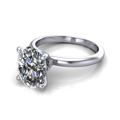 Quinn oval solitaire engagement ring in 14K White Gold with hidden halo and plain band, three-quarter perspective view