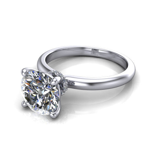 Quinn round solitaire engagement ring in 14K White Gold with hidden halo and plain band, three-quarter perspective view