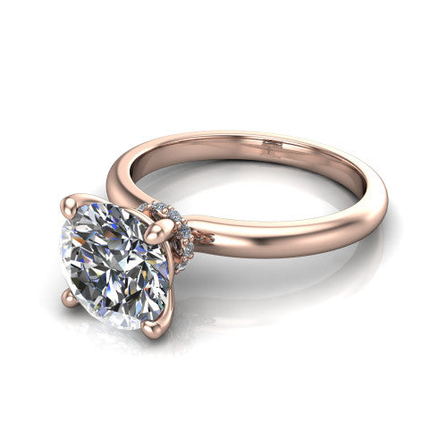 Quinn round solitaire engagement ring in 14K Rose Gold with hidden halo and plain band, three-quarter perspective view